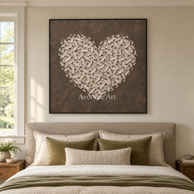 Quiet Verse relief mosaic wall art with a black frame above a bed in a bedroom