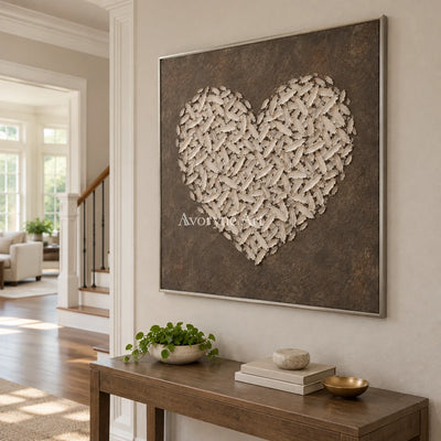 Quiet Verse relief mosaic wall art with a silver frame in an entryway