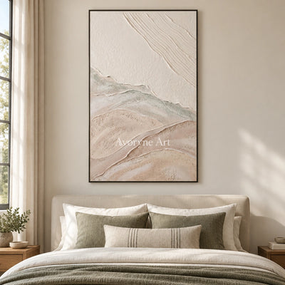 Quiet Current ripple relief wall art with a black frame above a bed in a bedroom