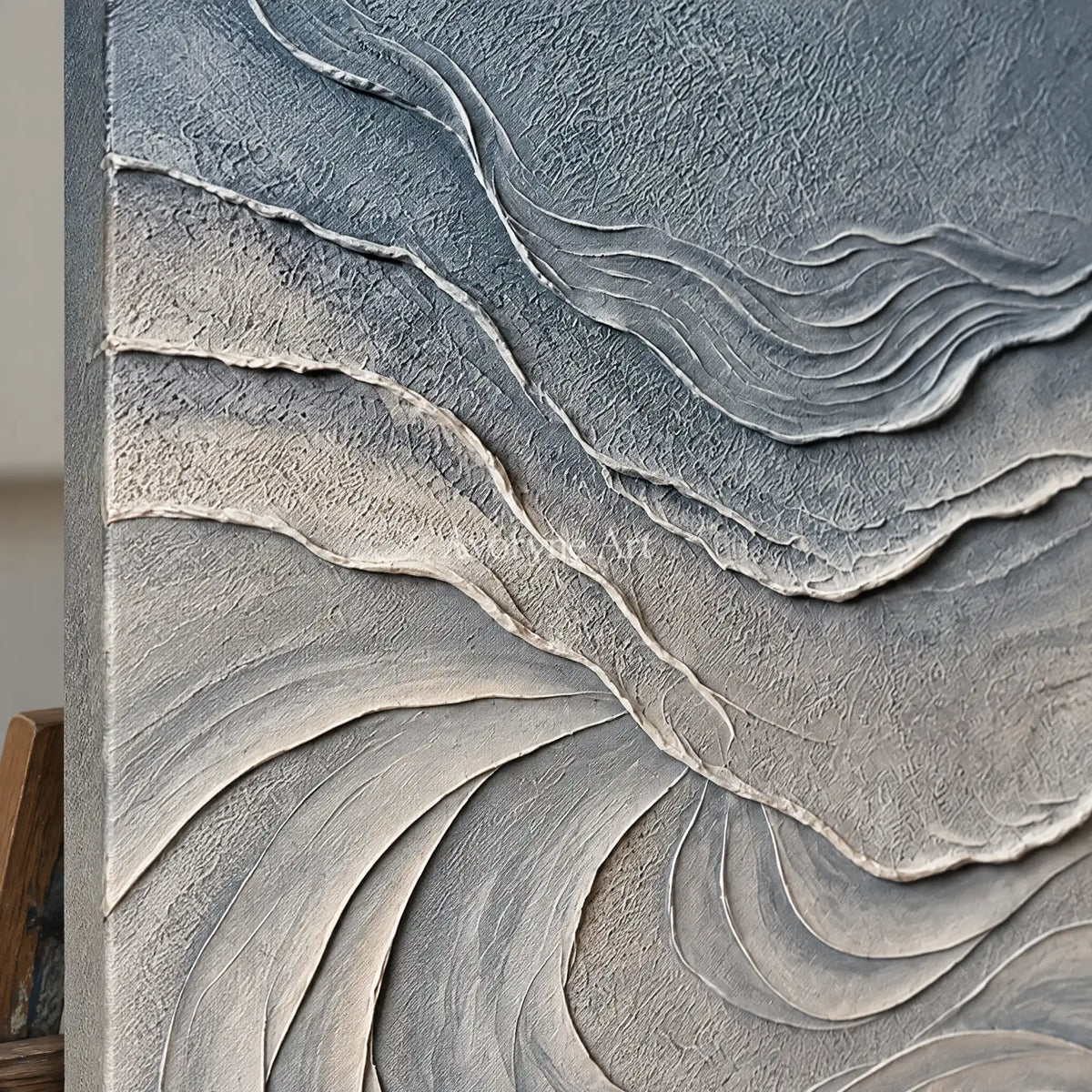 Close-up of the hand-painted texture of Quiet Dialogue ripple relief wall art on an easel