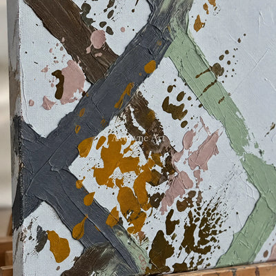 Close-up of the hand-painted texture of Weathered Cadence sage earth grid wall art on an easel