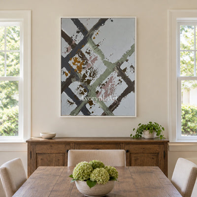 Weathered Cadence sage earth grid wall art with a white frame in a dining room