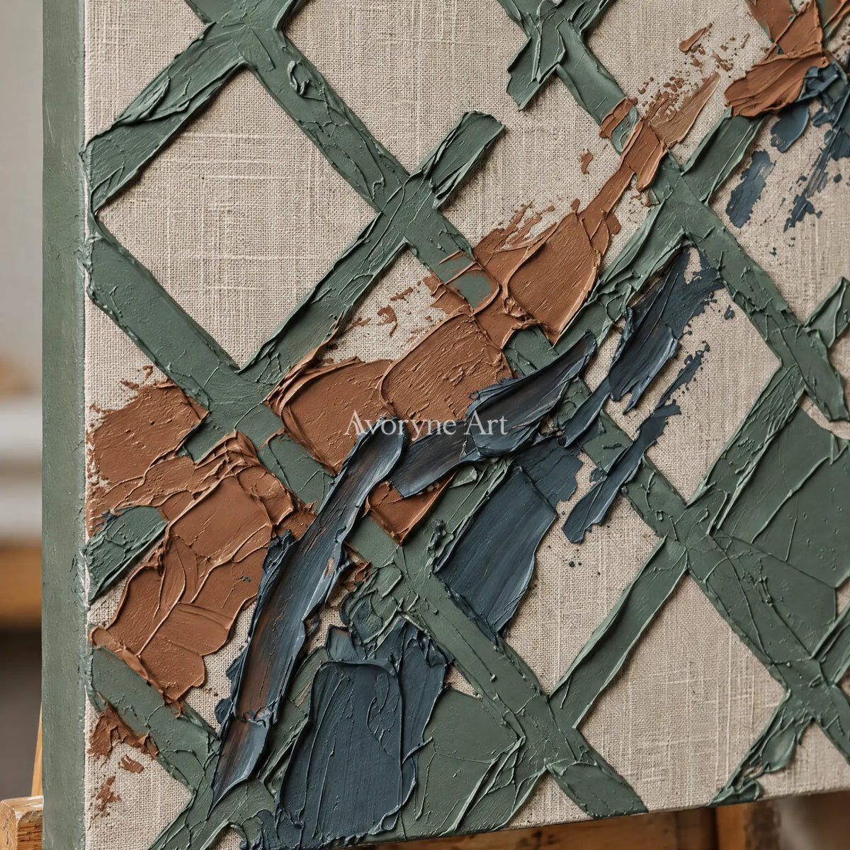 Close-up of the hand-painted texture of Weathered Solace sage earth grid wall art on an easel