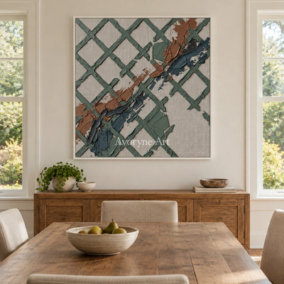 Weathered Solace sage earth grid wall art with a white frame in a dining room