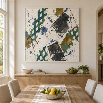 Earthen Echo sage earth grid wall art with a white frame in a dining room