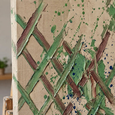 Close-up of the hand-painted texture of Earthen Trace sage earth grid wall art on an easel