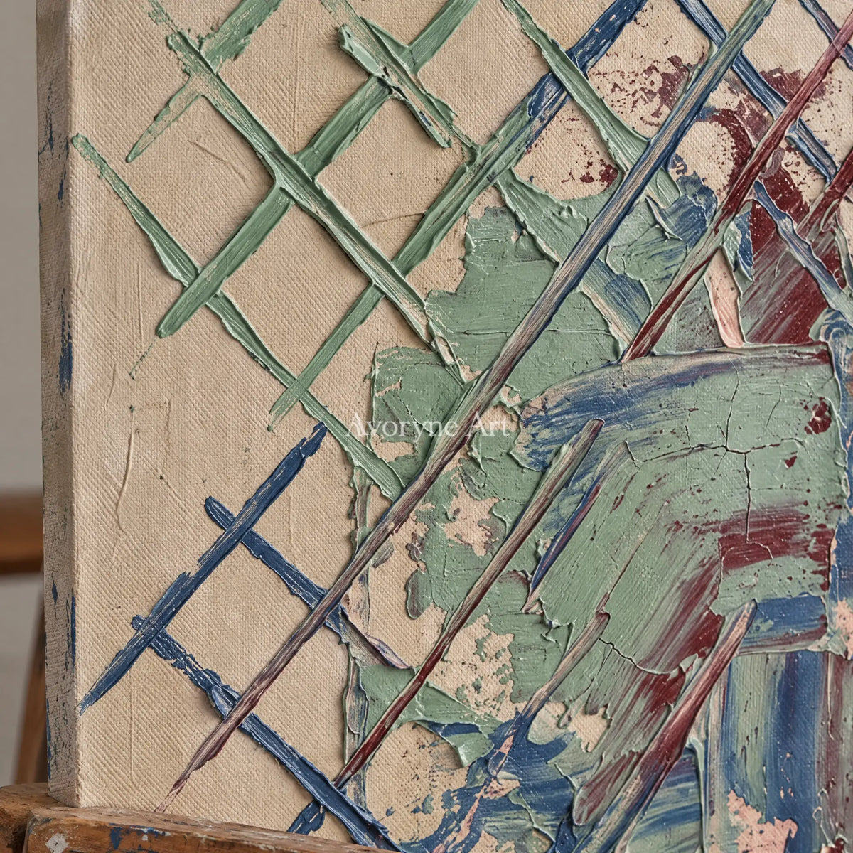 Close-up of the hand-painted texture of Earthen Current sage earth grid wall art on an easel