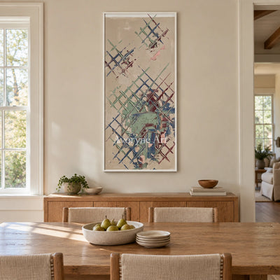 Earthen Current sage earth grid wall art with a white frame in a dining room