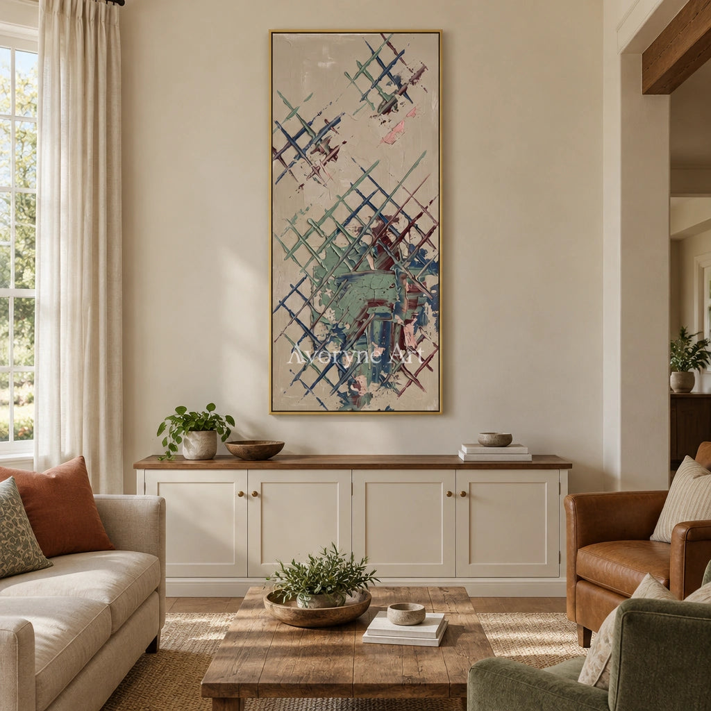 Earthen Current sage earth grid wall art with a gold frame hanging in a living room