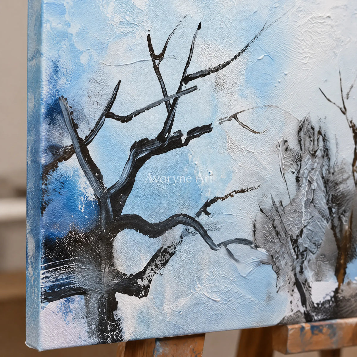 Close-up of the hand-painted texture of Pale Mosaic snow branch diptych on an easel