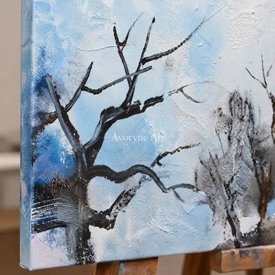 Close-up of the hand-painted texture of Pale Mosaic snow branch diptych on an easel