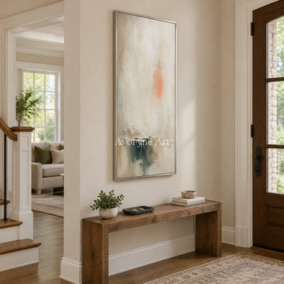 Woven Refrain soft neutral abstract wall art with a silver frame in an entryway