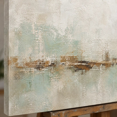 Close-up of the hand-painted texture of Woven Measure soft neutral abstract wall art on an easel