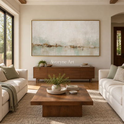 Woven Measure soft neutral abstract wall art with a gold frame hanging in a living room