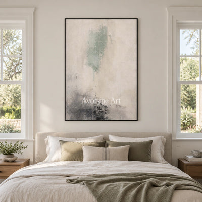 Woven Passage soft neutral abstract wall art with a black frame above a bed in a bedroom