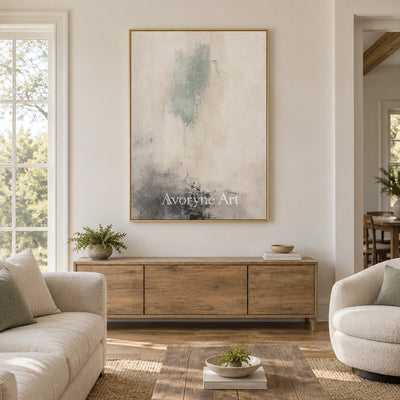 Woven Passage soft neutral abstract wall art with a gold frame hanging in a living room