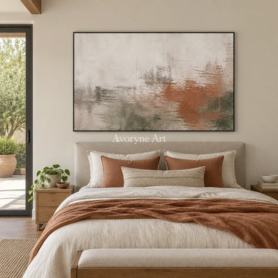 Woven Echo soft neutral abstract wall art with a black frame above a bed in a bedroom