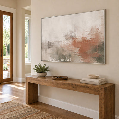 Woven Echo soft neutral abstract wall art with a silver frame in an entryway