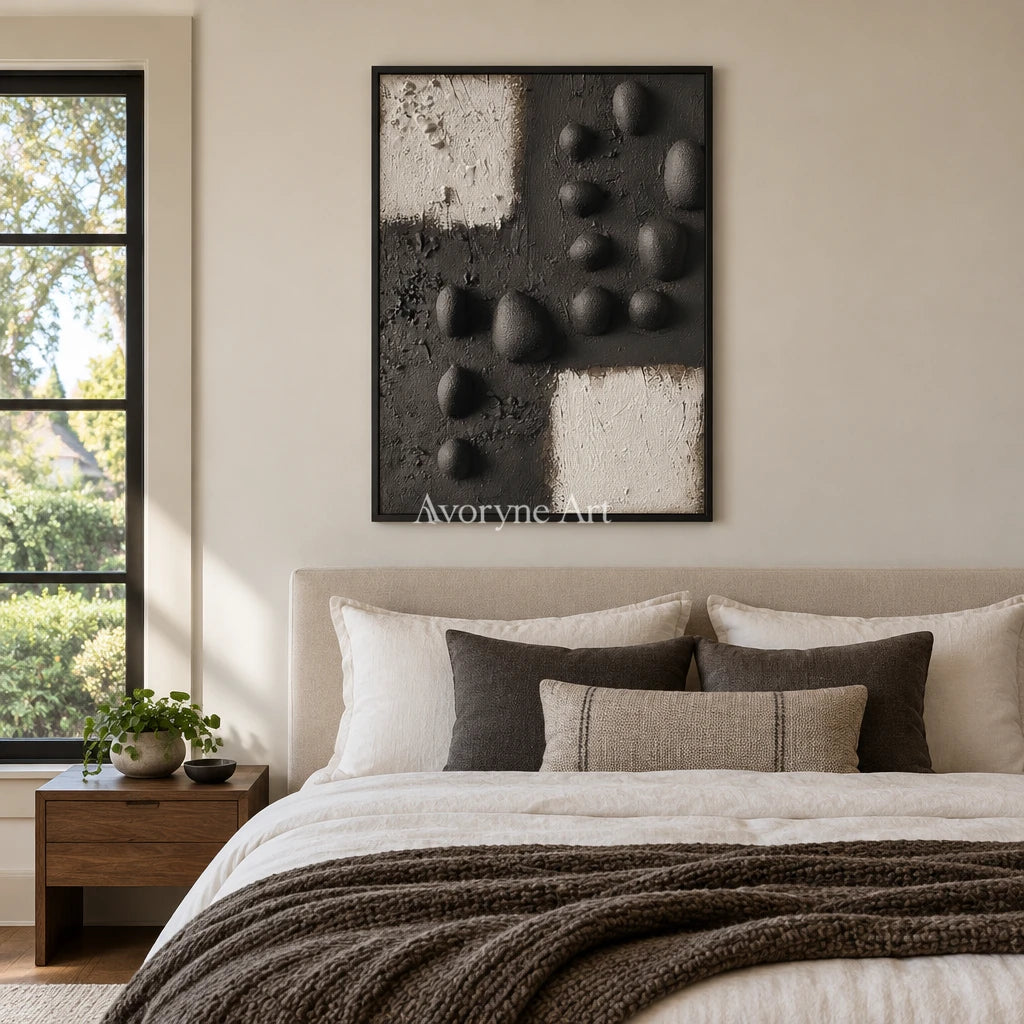 Lucent Sonata stone dot relief wall art with a black frame above a bed in a bedroom