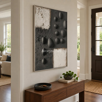 Lucent Sonata stone dot relief wall art with a silver frame in an entryway
