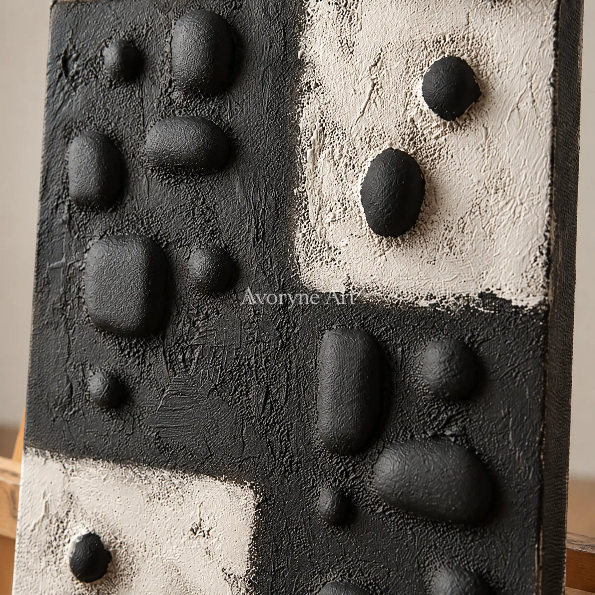 Close-up of the hand-painted texture of Muted Refrain stone dot relief wall art on an easel