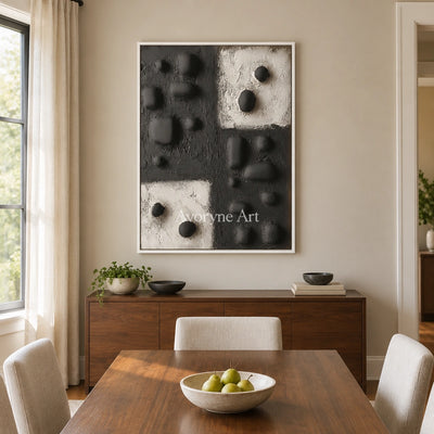 Muted Refrain stone dot relief wall art with a white frame in a dining room