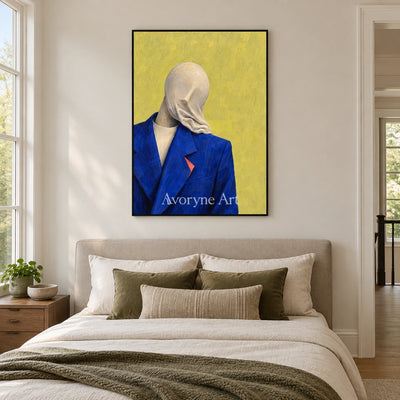 Still Gesture surreal scene wall art with a black frame above a bed in a bedroom