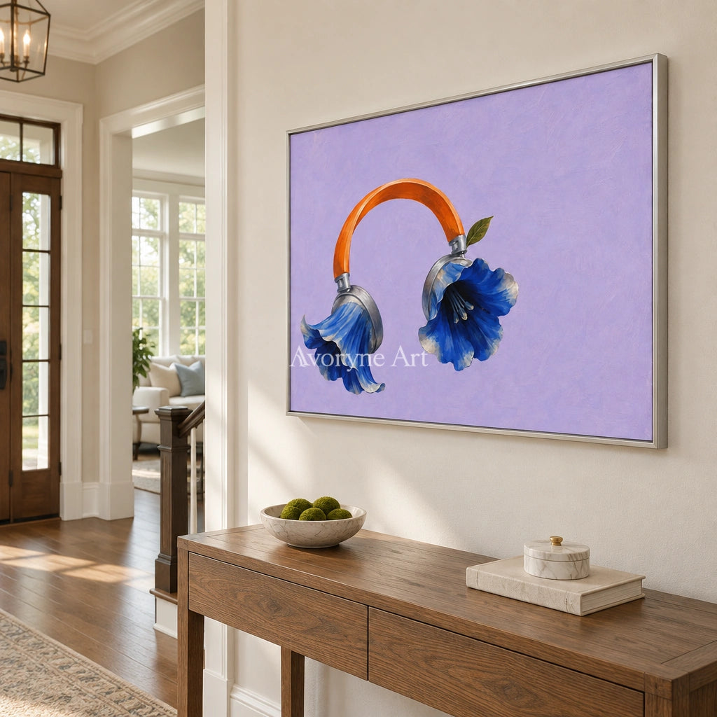 Still Verse surreal scene wall art with a silver frame in an entryway