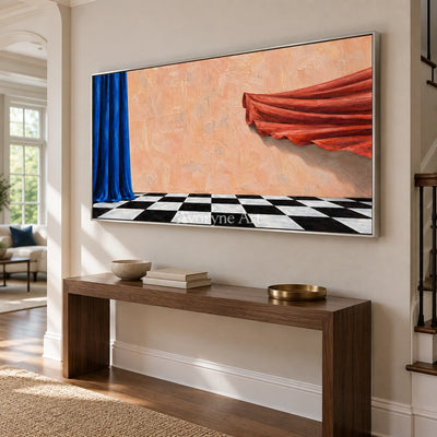 Tender Solace surreal scene wall art with a silver frame in an entryway