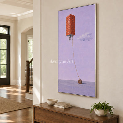 Tender Dialogue surreal scene wall art with a silver frame in an entryway