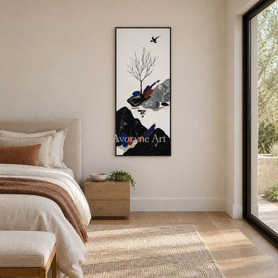 Misted Refrain surreal stone landscape wall art with a black frame above a bed in a bedroom
