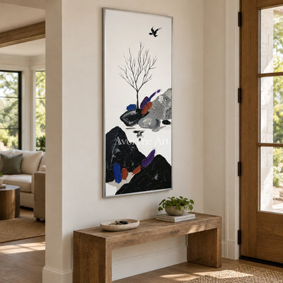 Misted Refrain surreal stone landscape wall art with a silver frame in an entryway
