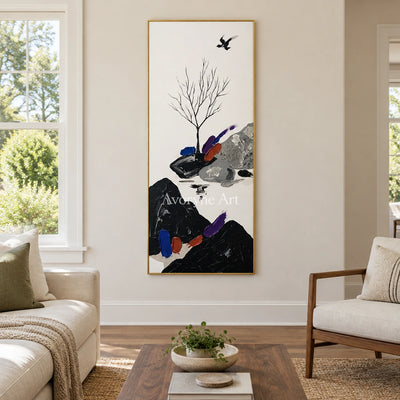 Misted Refrain surreal stone landscape wall art with a gold frame hanging in a living room