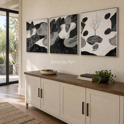 Misted Haven surreal stone landscape triptych with a silver frame in an entryway