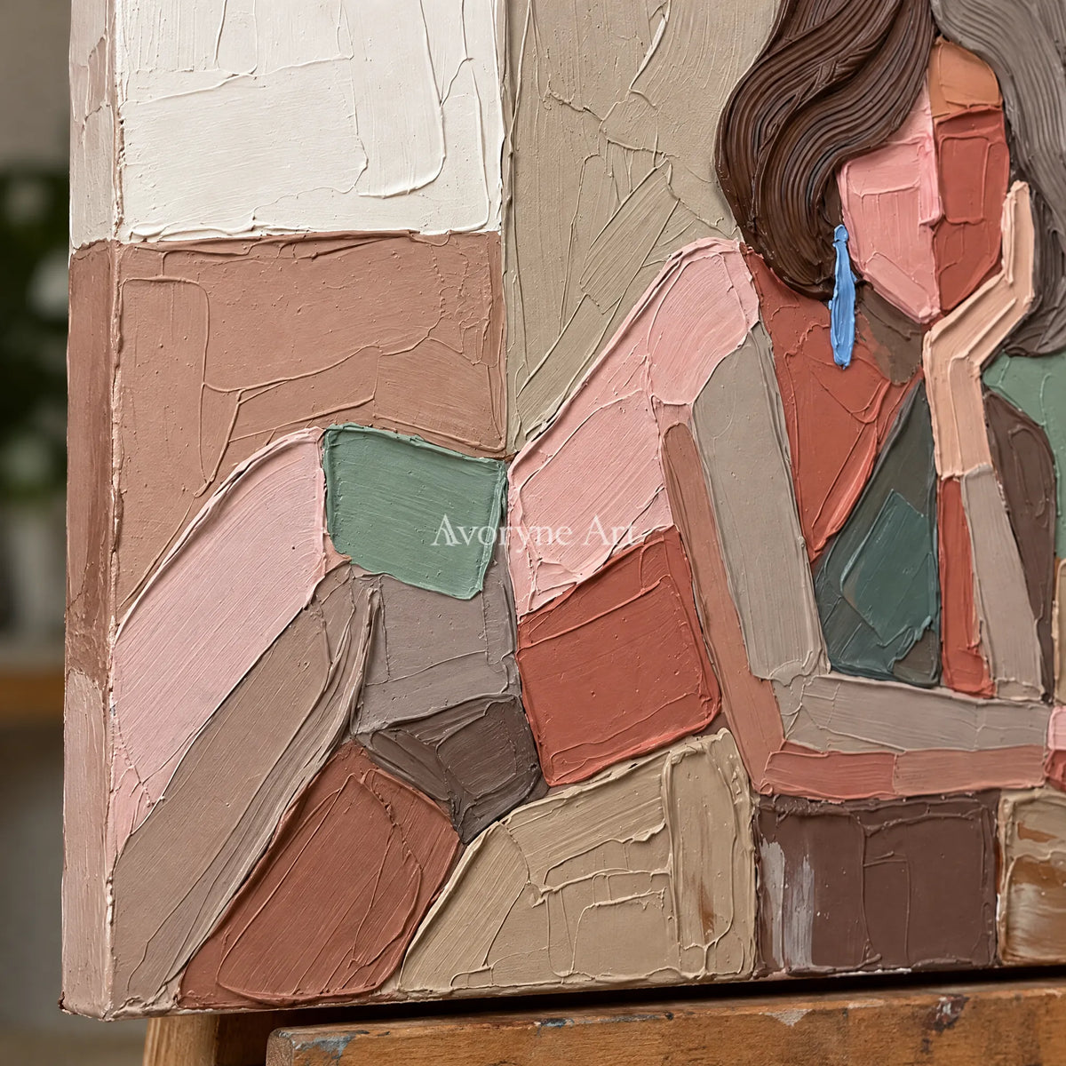 Close-up of the hand-painted texture of Verdant Trace textured portrait wall art on an easel