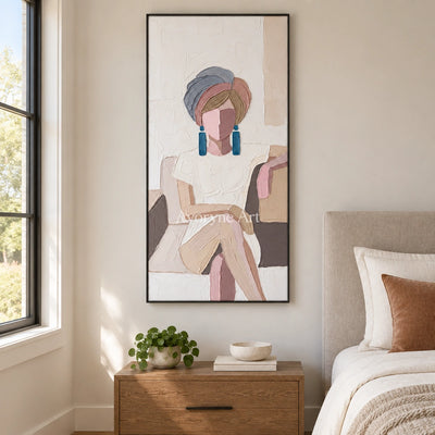 Verdant Story textured portrait wall art with a black frame above a bed in a bedroom