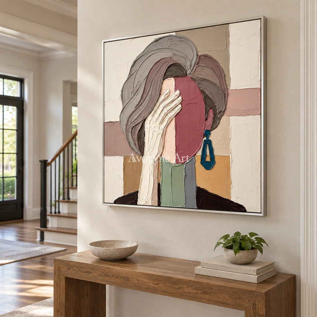 Blue Cadence textured portrait wall art with a silver frame in an entryway