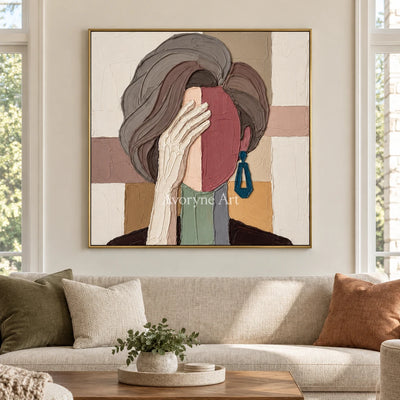 Blue Cadence textured portrait wall art with a gold frame hanging in a living room
