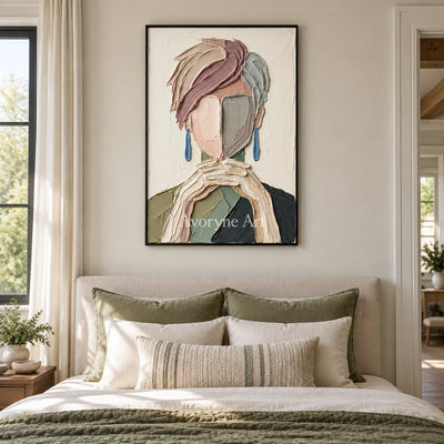 Blue Passage textured portrait wall art with a black frame above a bed in a bedroom