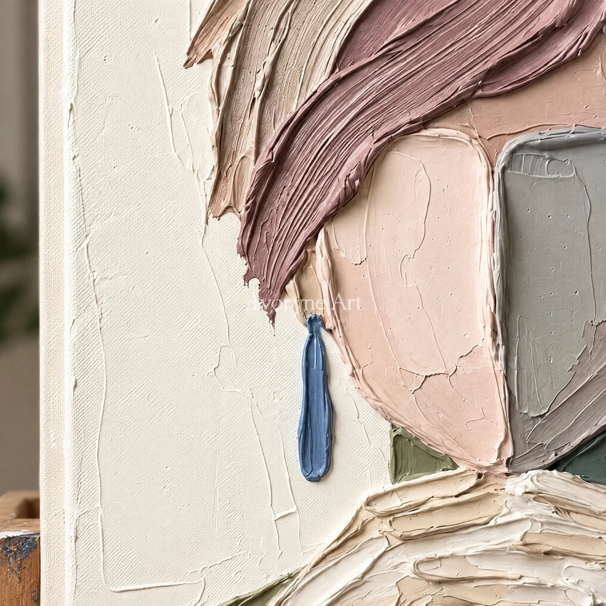 Close-up of the hand-painted texture of Blue Passage textured portrait wall art on an easel