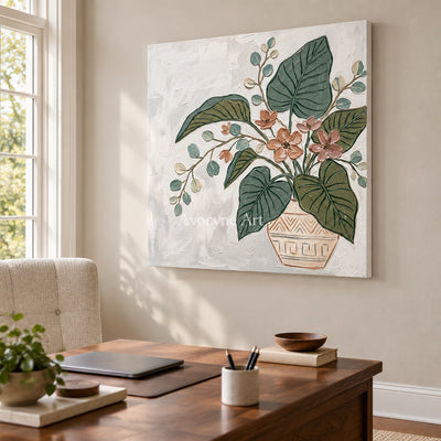Silver Passage vase and foliage wall art as a frameless stretched canvas in a home office