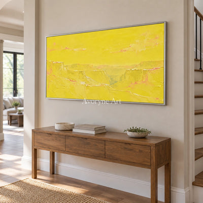 Tender Echo vivid landscape wall art with a silver frame in an entryway