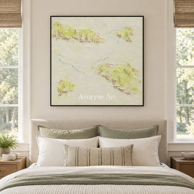 Tender Vista vivid landscape wall art with a black frame above a bed in a bedroom