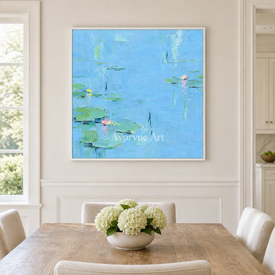 Tender Gesture water lily wall art with a white frame in a dining room