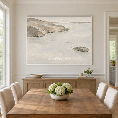 Still Solace waterside landscape wall art with a white frame in a dining room