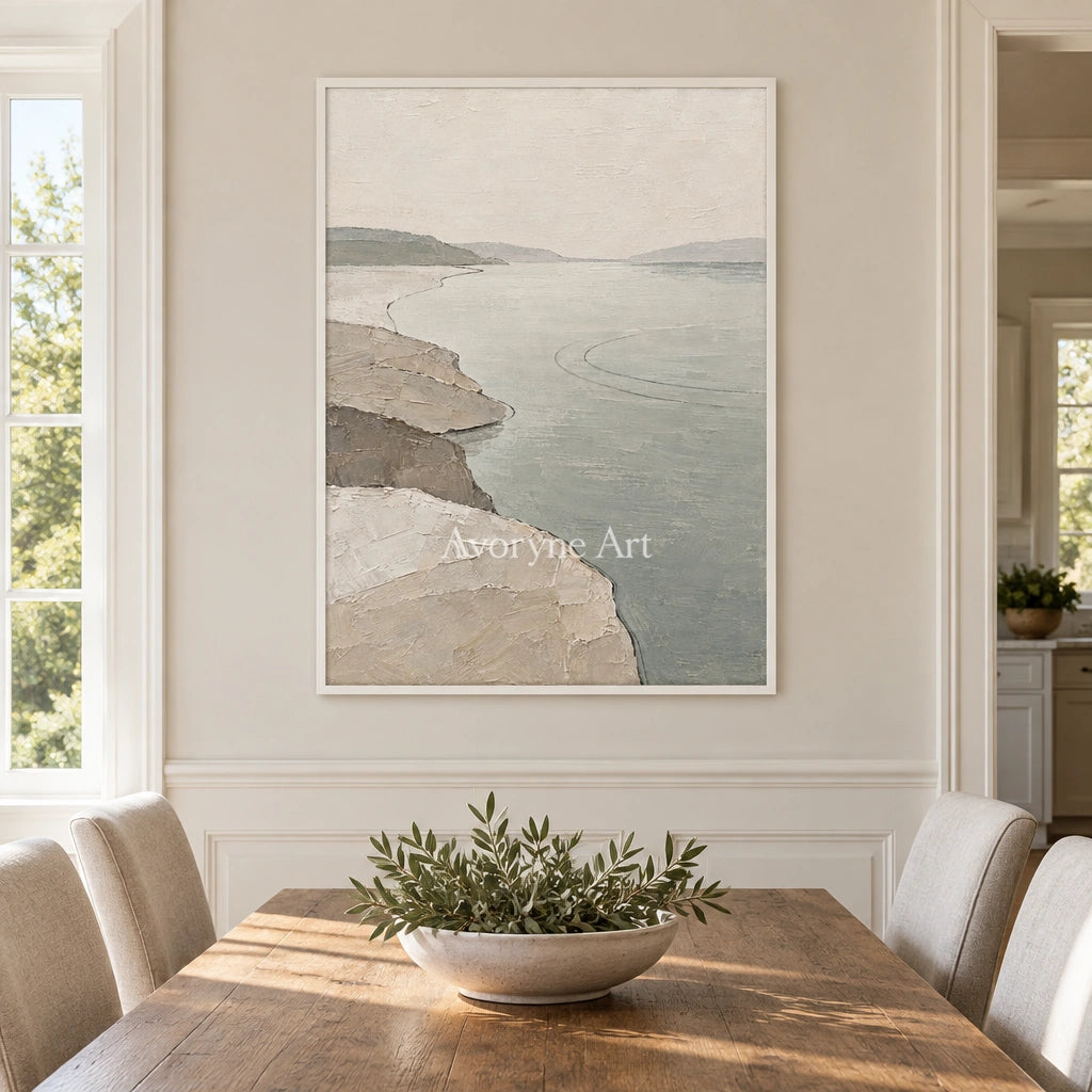 Tender Reverie waterside landscape wall art with a white frame in a dining room