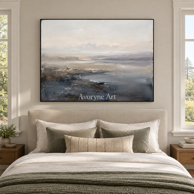 Winding Current waterside landscape wall art with a black frame above a bed in a bedroom