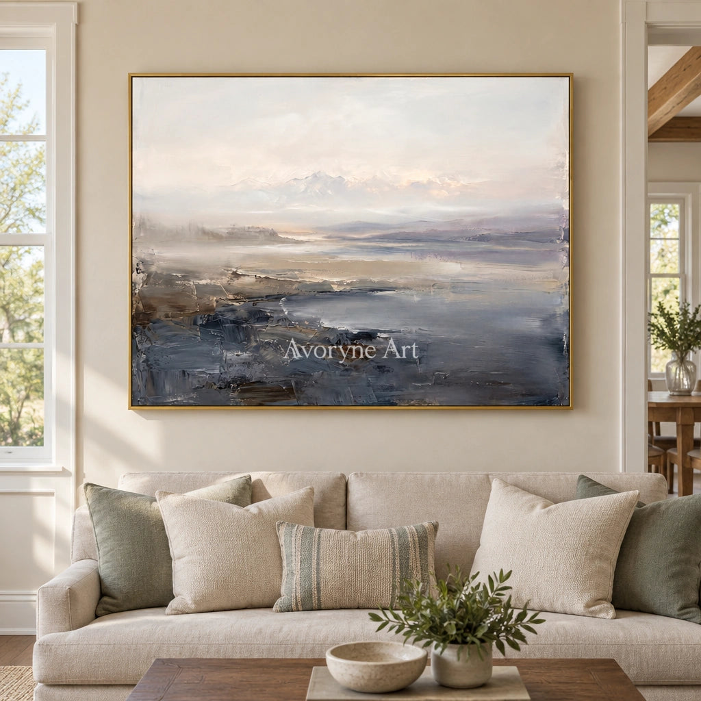 Winding Current waterside landscape wall art with a gold frame hanging in a living room