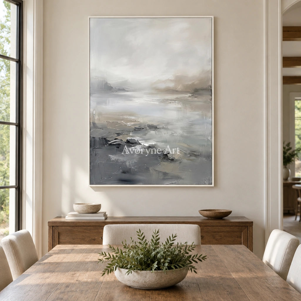 Winding Solace waterside landscape wall art with a white frame in a dining room
