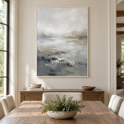 Winding Solace waterside landscape wall art with a white frame in a dining room